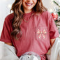 Christmas Cake, Ribbon, Bow, Pocket Tee Comfort Colors T-Shirt