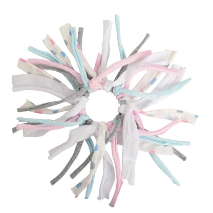 Circular dog toy with multicolored fabric strips on a white background