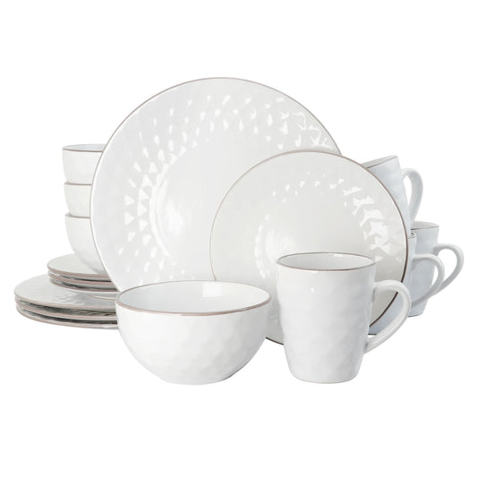 A 16 piece dinnerware set by Elama featuring a pearl and slate color scheme with a diamond shaped texture.