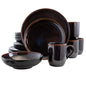 A 16 piece round stoneware dinnerware set in metallic black with brown trim, including plates, bowls, and cups.