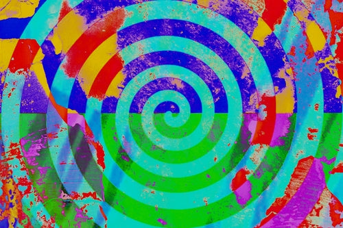 Colorful spiral design with a mix of bright colors on a multicolored background