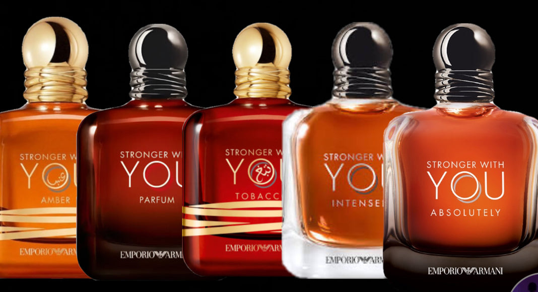 Five bottles of Emporio Armani perfume with different labels on a black background