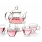 6-Piece Glass Tea Pot Set with 4 Cups Teapot Warmer and Infuser | Kitchen + Metal