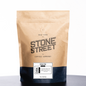 Kraft paper coffee bag with 'Stone Street Coffee Company' branding on a white background