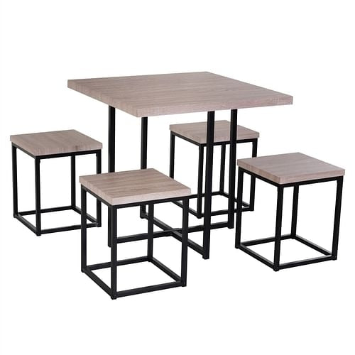 A five piece kitchen dining set with a square natural wood table and four black steel chairs with a scissor mechanism for the chairs to tuck under the table.