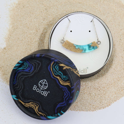 Headland Necklace – Aqua Resin & Sand Arc Pendant