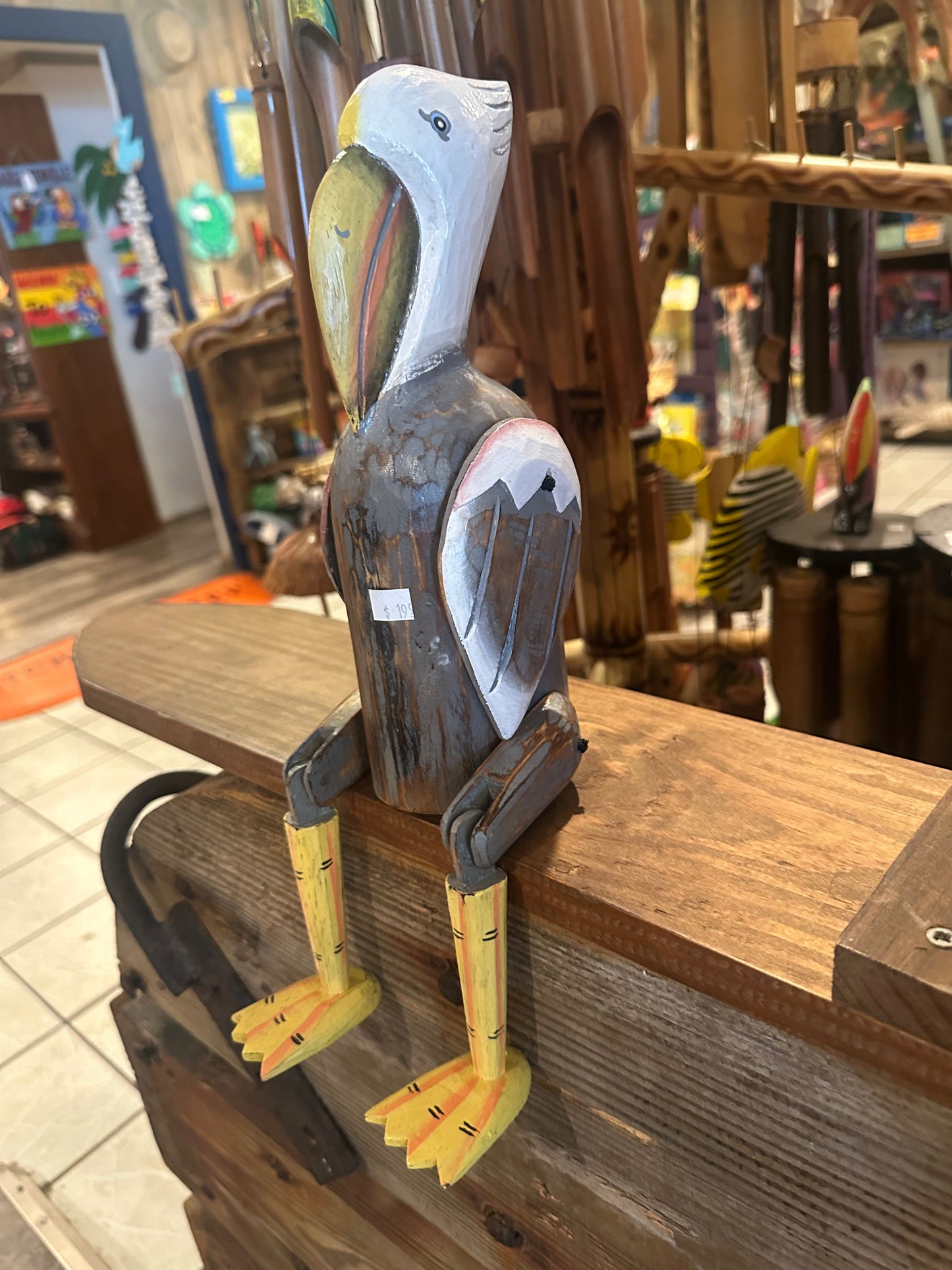 Wooden Shelf Sitting Pelican