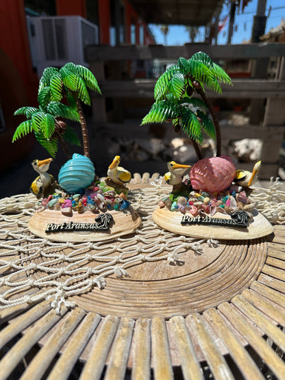 Seashell Beach Scene with Pelicans