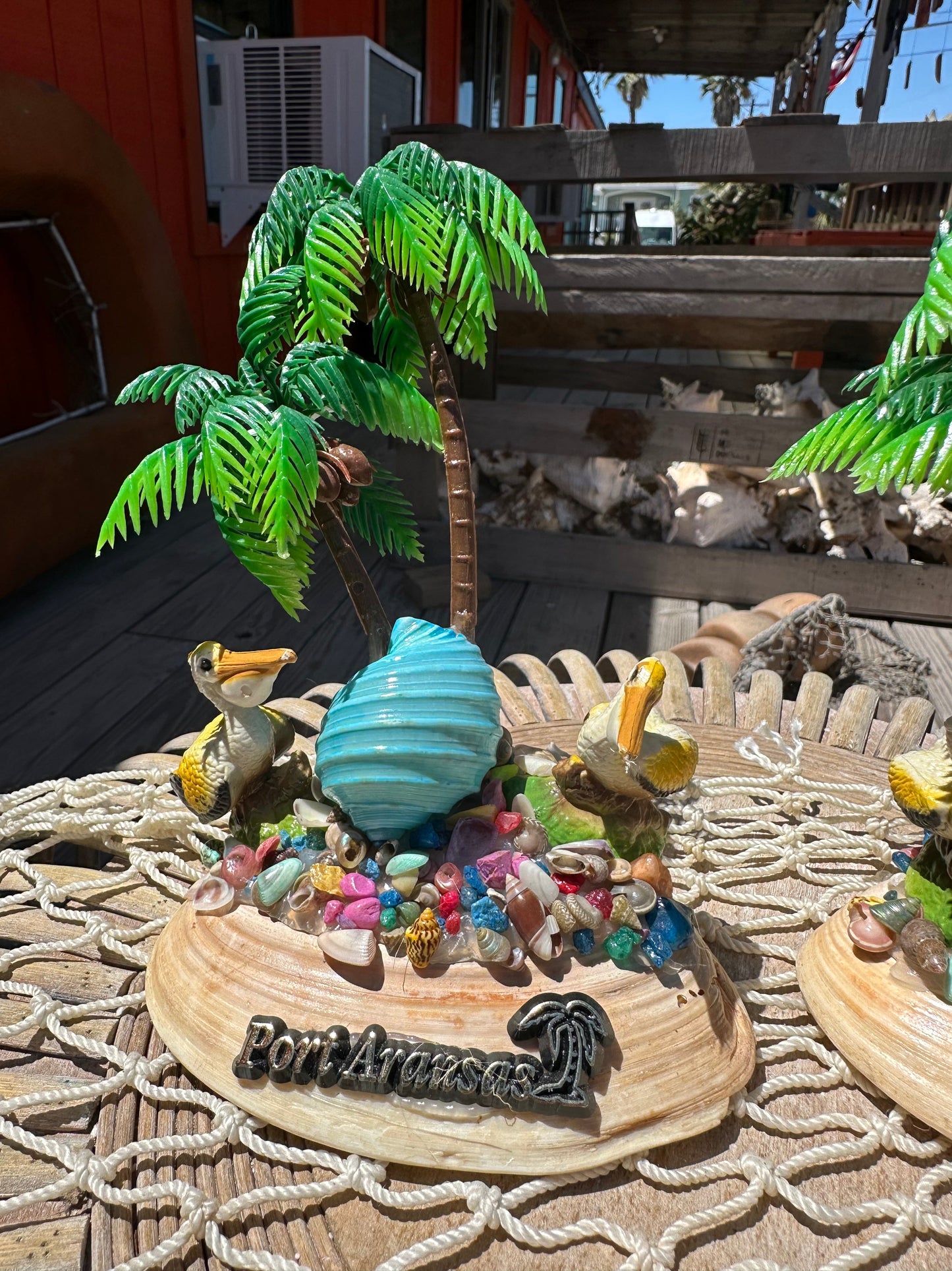 Seashell Beach Scene with Pelicans