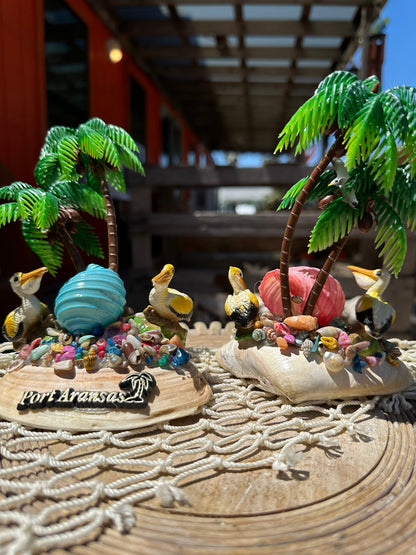 Seashell Beach Scene with Pelicans