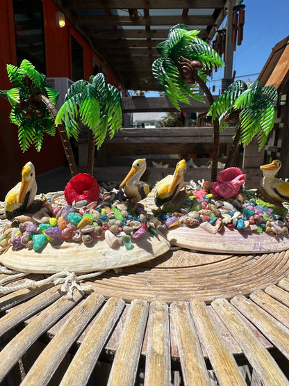 Seashell Beach Scene with Pelicans