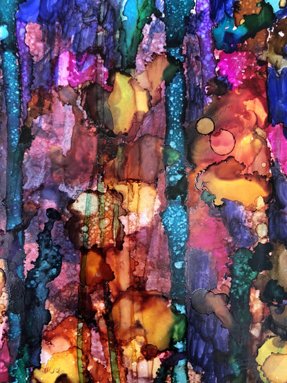 Colorful abstract art with vibrant hues of blue, green, pink, and orange.