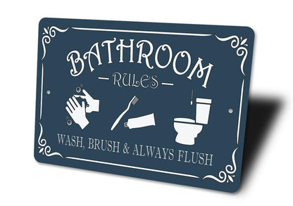 Navy blue sign with white text and icons for bathroom rules on a white background