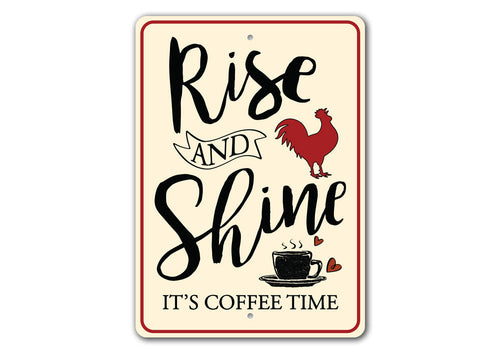 Decorative sign with text 'Rise and Shine, It's Coffee Time' featuring a rooster and coffee cup on a beige background.