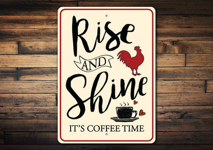 Decorative sign with 'Rise and Shine, It's Coffee Time' text on a wooden background