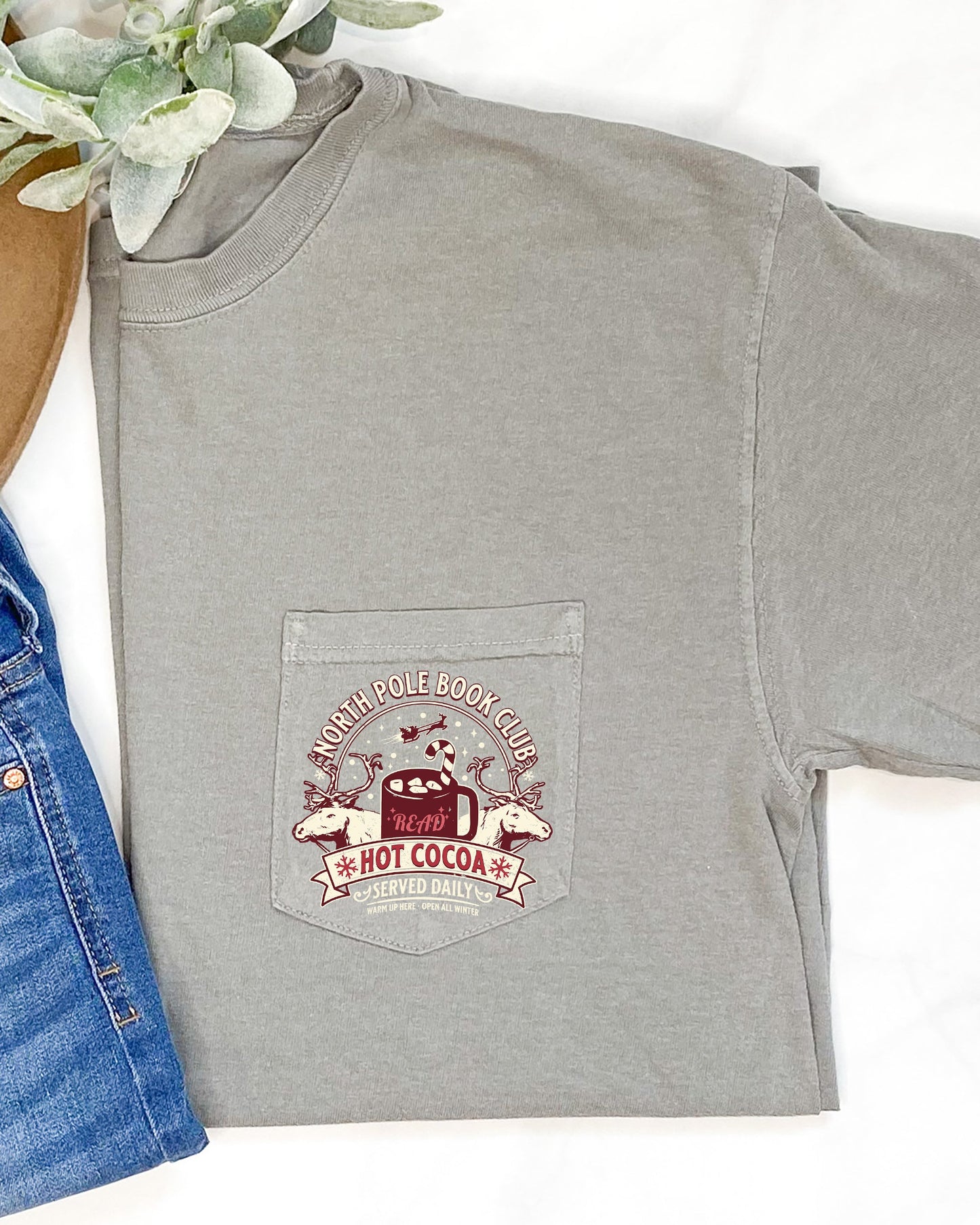 North Pole Book Club, Pocket, Hot Cocoa, Booktok, Christmas, Winter, Snow, Reindeer, Santa, Xmas Pocket Tee Comfort Colors T-Shirt