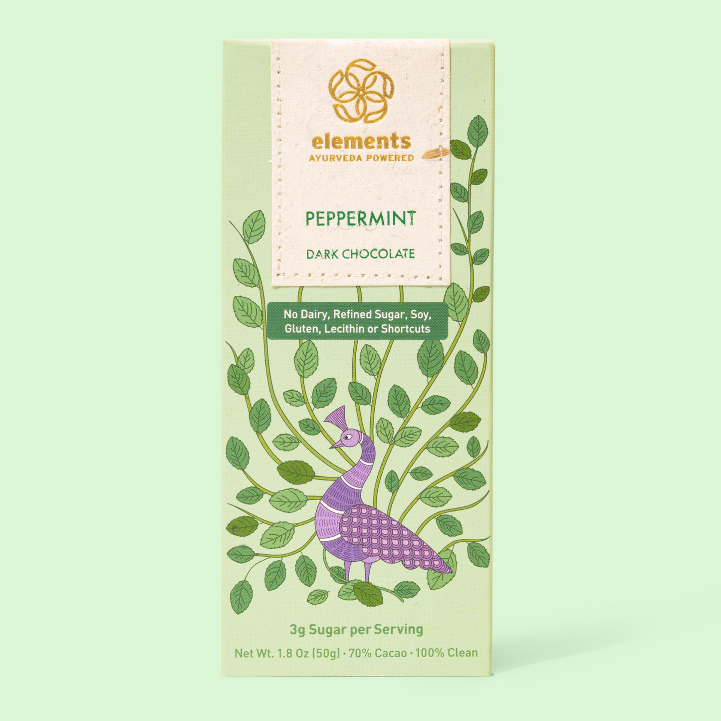 Elements peppermint dark chocolate packaging on a light green background