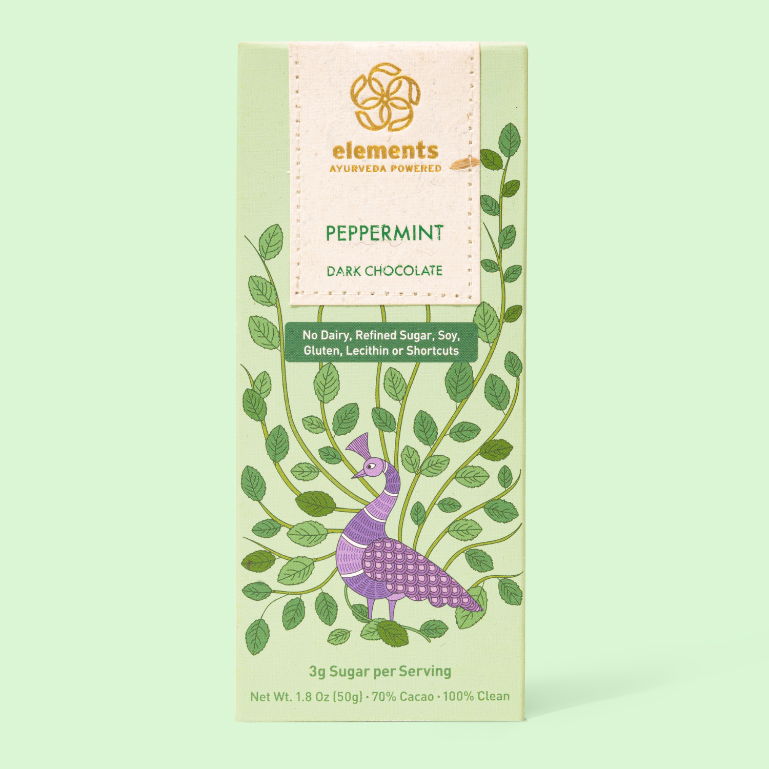 Elements peppermint dark chocolate packaging on a light green background