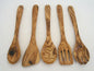 A set of five olive wood kitchen utensils including a sauce spoon, spoon, spork, cooking spoon, and spatula, displayed against a white background.