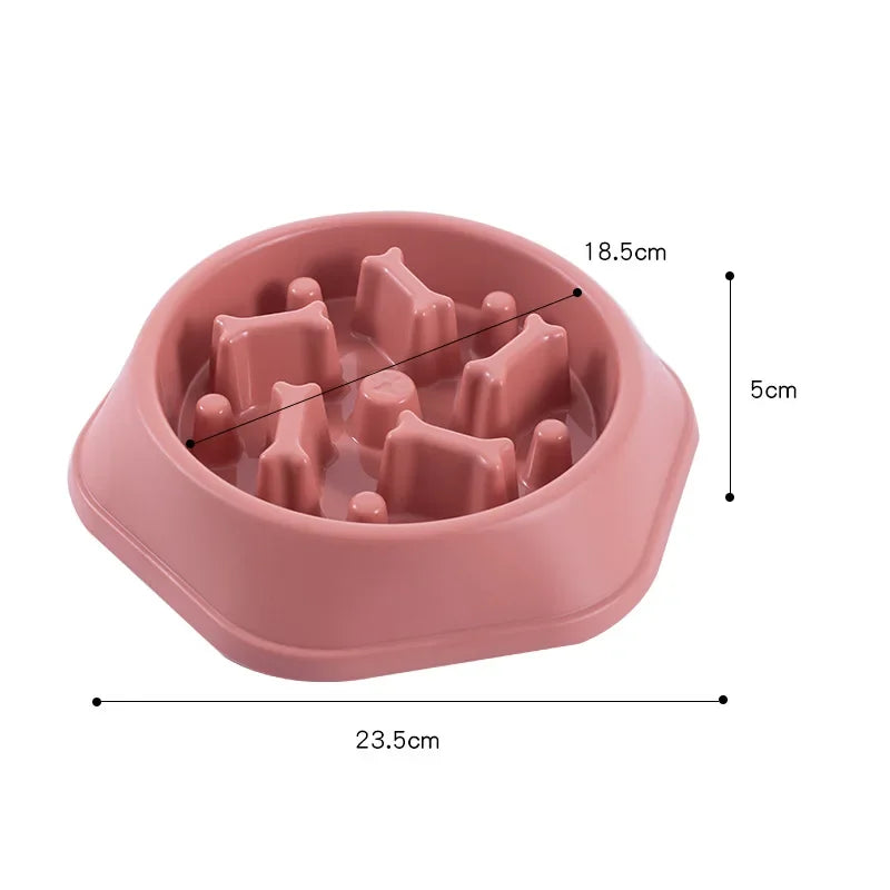 Pink slow feed dog bowl with measurements on a white background