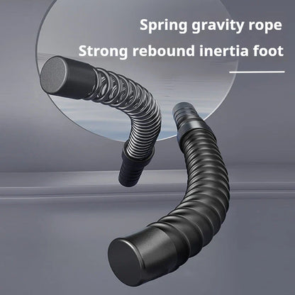 Black flexible hose with spring gravity rope feature on a gray background