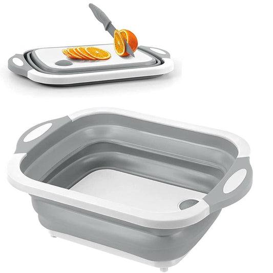 A collapsible cutting board in gray and white, shown both in its folded and unfolded states with sliced oranges on top, indicating usage.