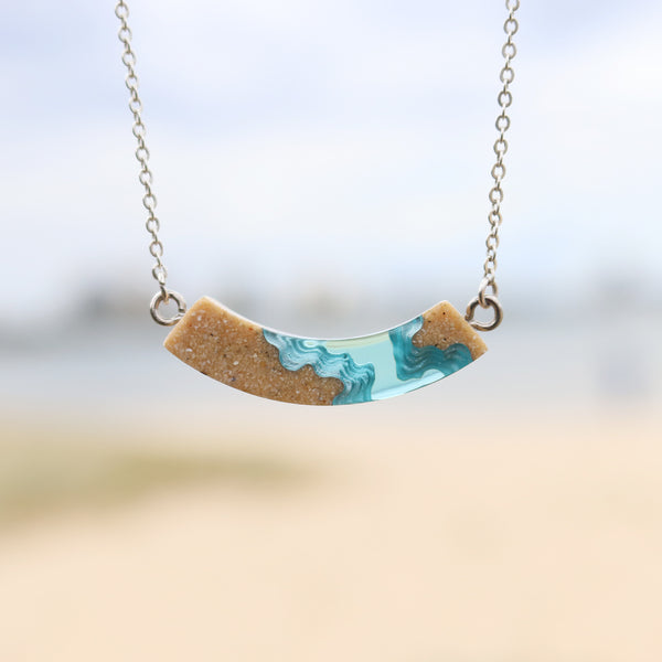 Headland Necklace – Aqua Resin & Sand Arc Pendant