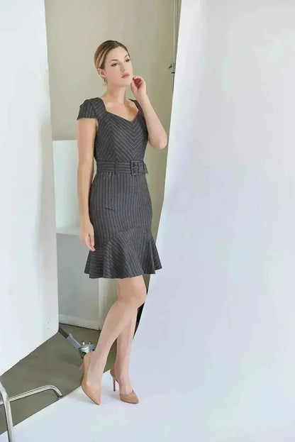 Chelsea Dress - Cap sleeve pinstripe dress with self belt and ruffle