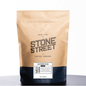 Kraft paper coffee bag with 'Stone Street Coffee Company' branding on a white background