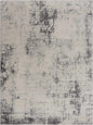 Textured area rug with a mix of gray and black colors on a white background