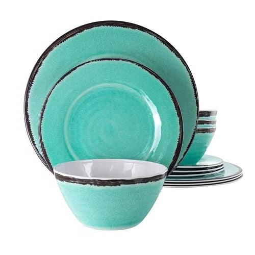 A set of turquoise blue melamine dinnerware with black lined rims, including plates and bowls.