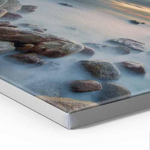 Canvas print of rocks and water with a white border
