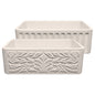 Farmhaus Fireclay Reversible Sink with a Gothichaus Swirl Design Front Apron on One Side, and a Fluted Front Apron on the Opposite Side.