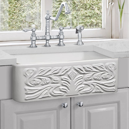 Farmhaus Fireclay Reversible Sink with a Gothichaus Swirl Design Front Apron on One Side, and a Fluted Front Apron on the Opposite Side.
