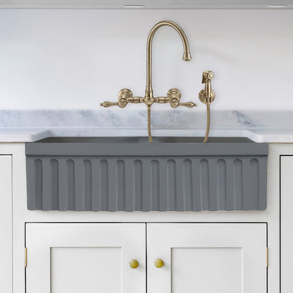 Farmhaus Fireclay Quatro Alcove Reversible Double Bowl Sink with a Fluted Front Apron and 2" Lip on One Side and 2 ½" Lip on the Opposite Side