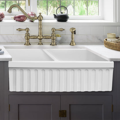 Farmhaus Fireclay Quatro Alcove Reversible Double Bowl Sink with a Fluted Front Apron and 2" Lip on One Side and 2 ½" Lip on the Opposite Side
