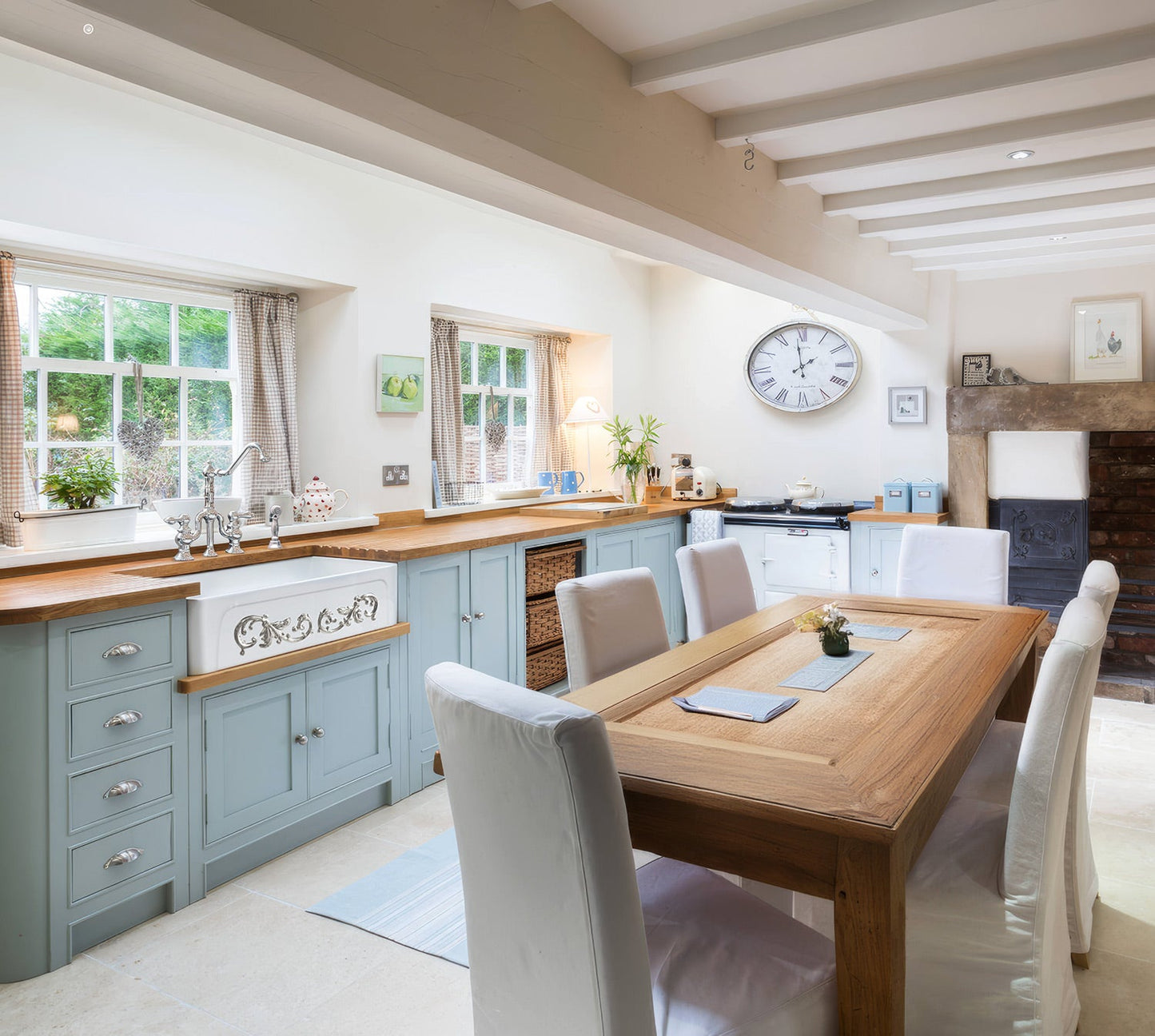 St. Ives Ornamental 33" Reversible Fireclay Kitchen Sink with  Intricate Embossed Vine Design Front Apron on one side and an Elegant Beveled Front Apron on the Opposite Side