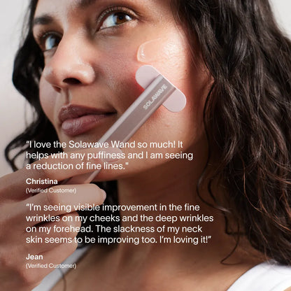 Woman using a Solawave Wand on her face with customer testimonials displayed.