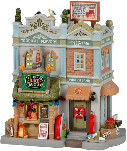 Toy model of a tropical-themed street with various shops and signs.