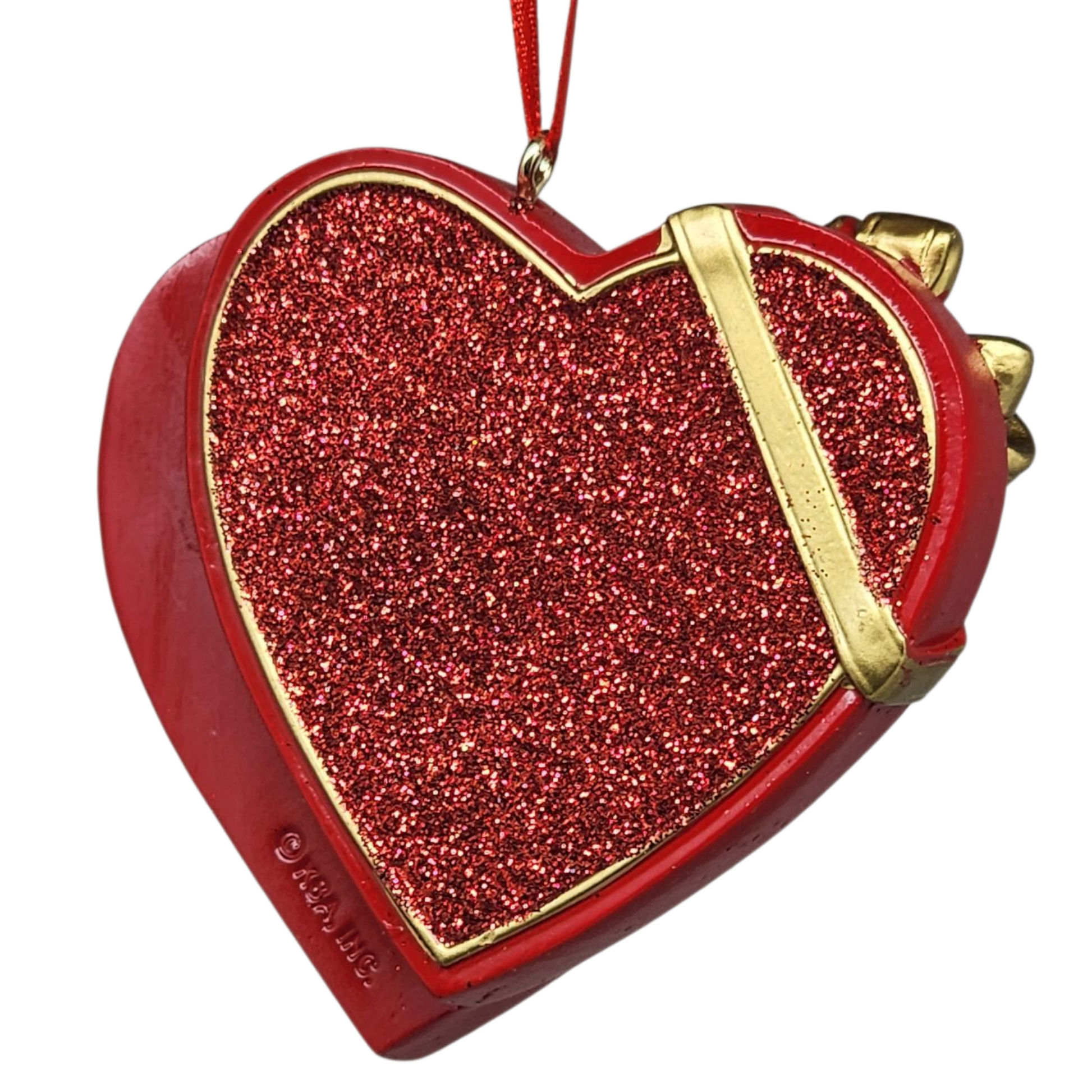 Red glittery heart-shaped box with gold accents on a white background