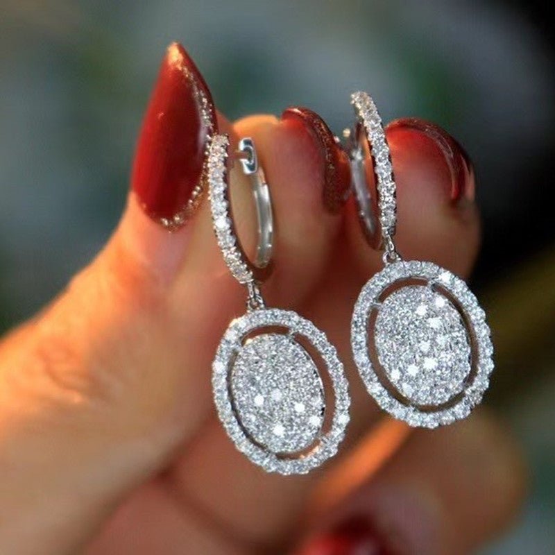 White Gold Oval Earrings - Stylish Elegance for Every Occasion