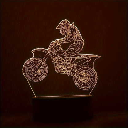 Motorcycle and rider silhouette lamp on a dark background