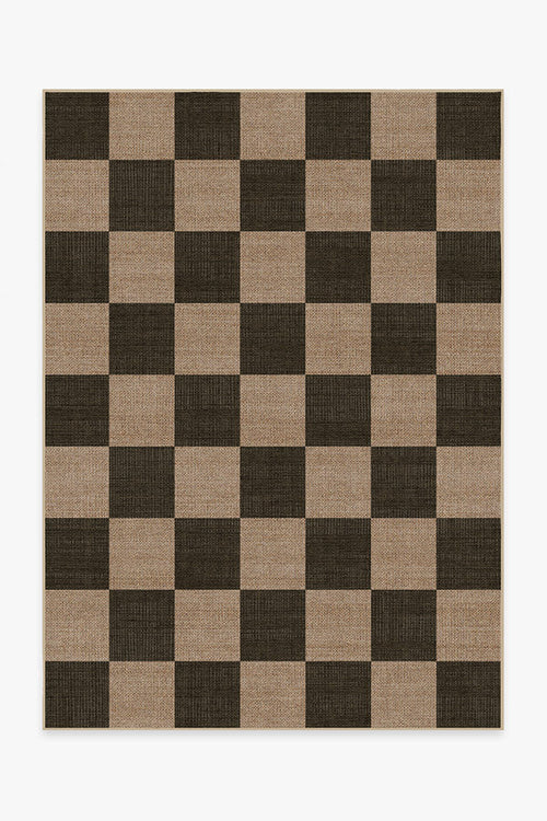 Checkered rug with brown and beige squares on a white background