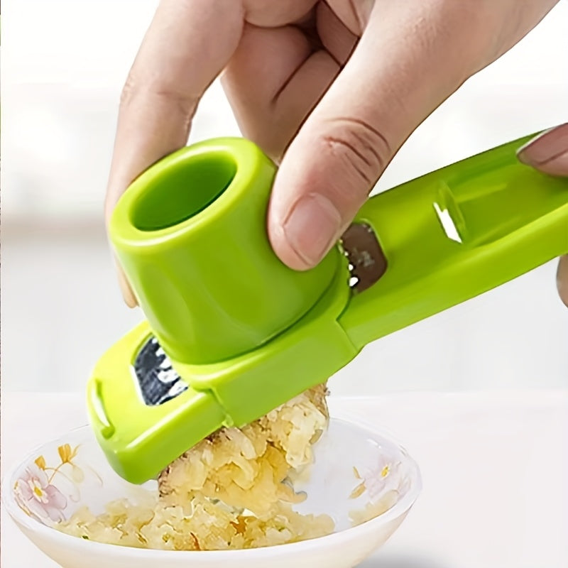 up close image of green garlic press being used