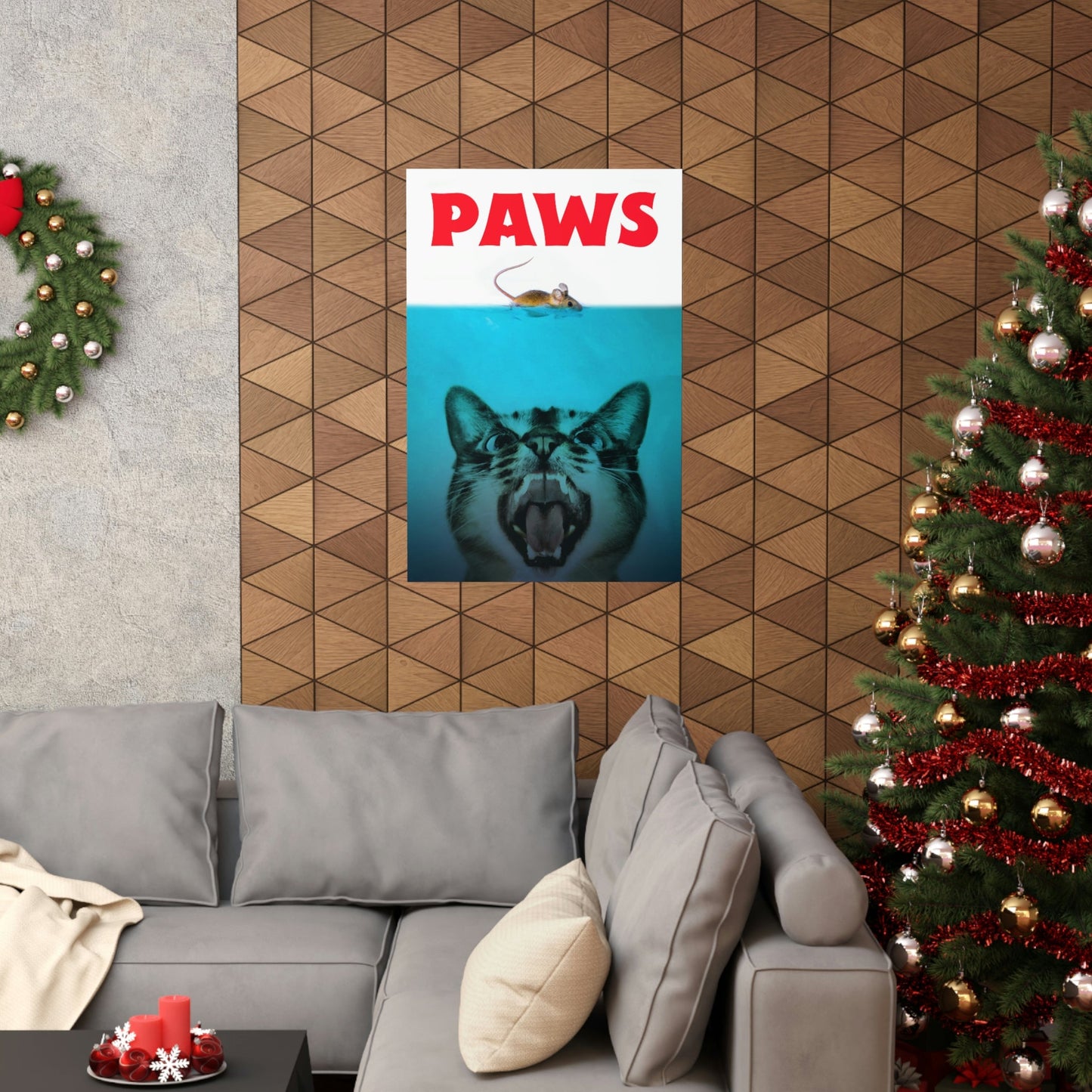 Living room with a 'PAWS' poster on the wall, Christmas tree, and sofa.