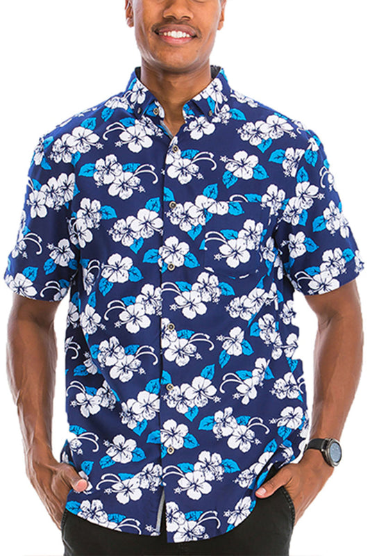 Man wearing a navy blue shirt with white and blue floral pattern on a white background