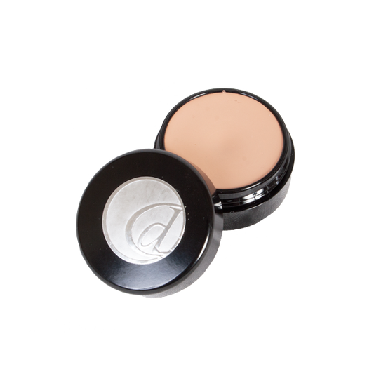 Compact powder in a black case on a white background