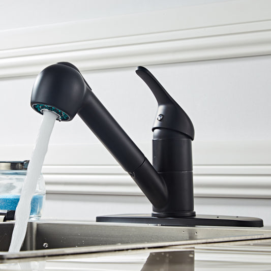 A black copper kitchen faucet with a flexible hose is turned on, running water into a stainless steel sink.