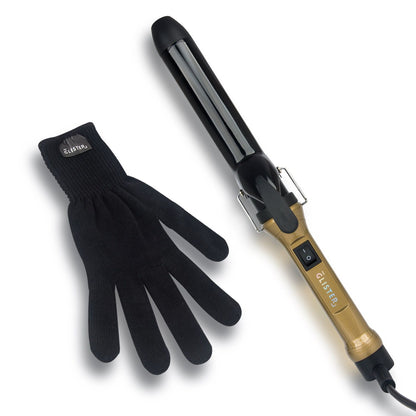 Curling iron and black gloves on a white background