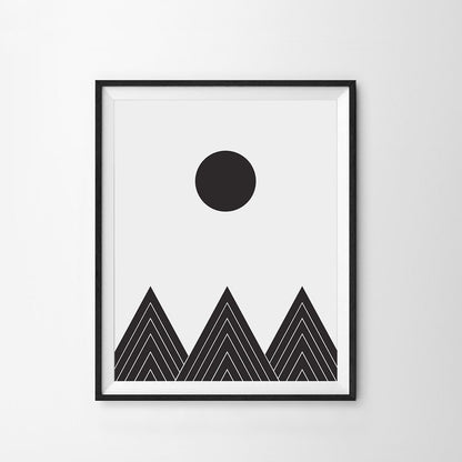 Framed black and white abstract art print with geometric shapes on a light gray background